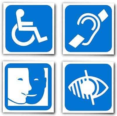 Four blue accessibility icons highlight key aspects of web accessibility: a wheelchair user, hearing aid symbol, two faces for communication assistance, and an eye with a slash representing visual impairment. - Clio Websites | Top Canadian Web Design Company